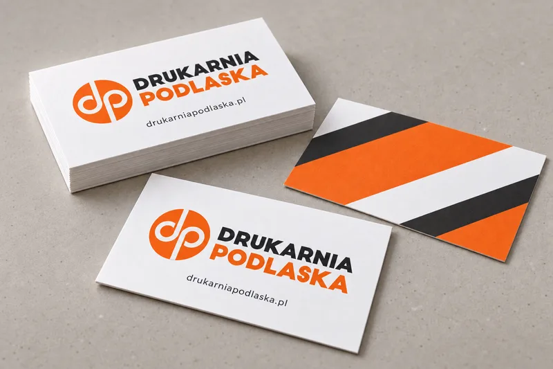 Wizytówki z pomarańczowo-grafitowym nadrukiem Drukarni Podlaskiej